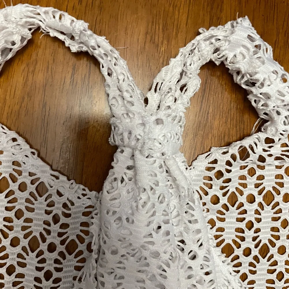 EUC swim coverup with adjustable straps and back. Excellent condition.